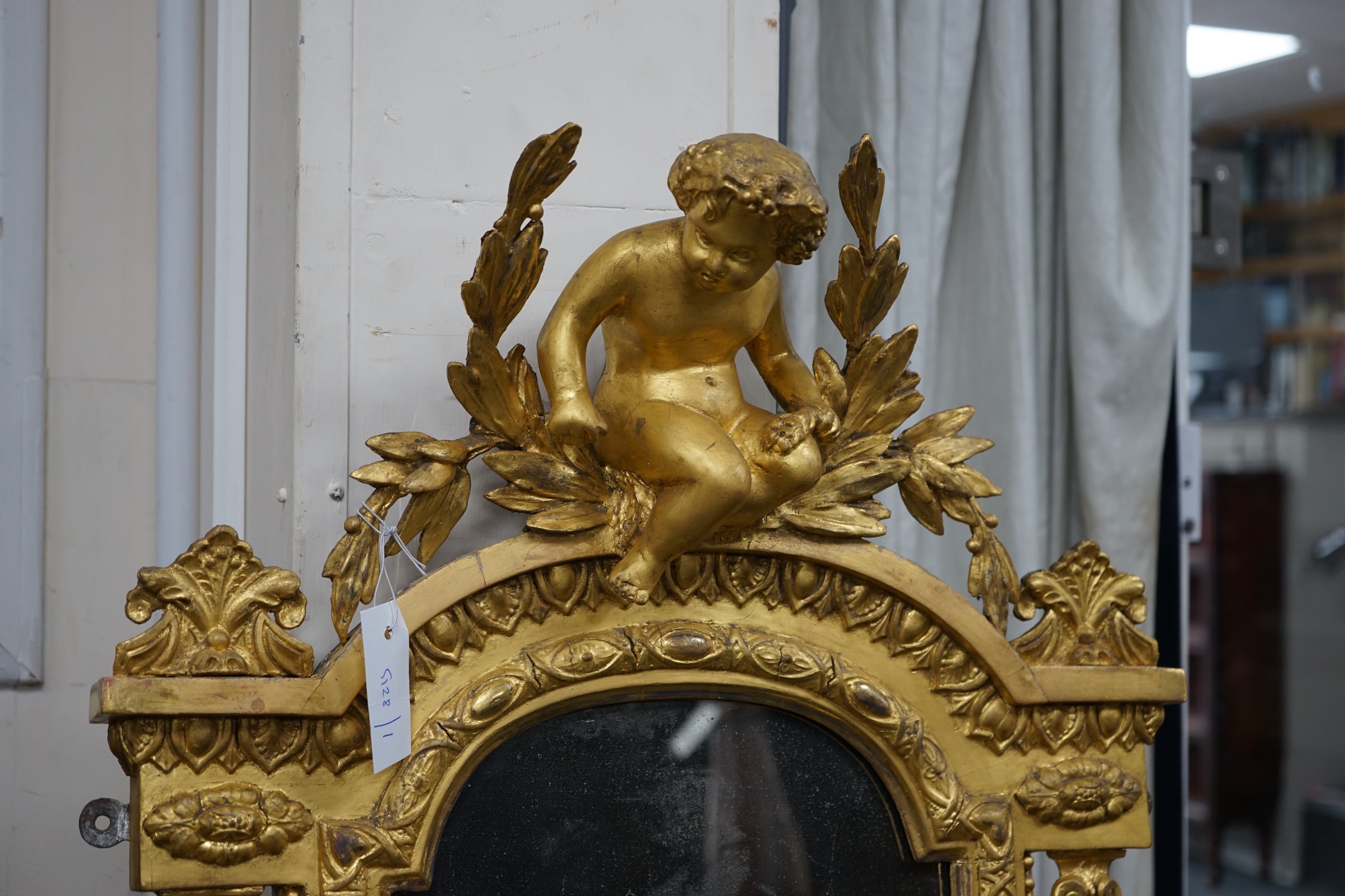 A 19th century giltwood and gesso girandole pier glass, width 54cm height approx. 155cm
